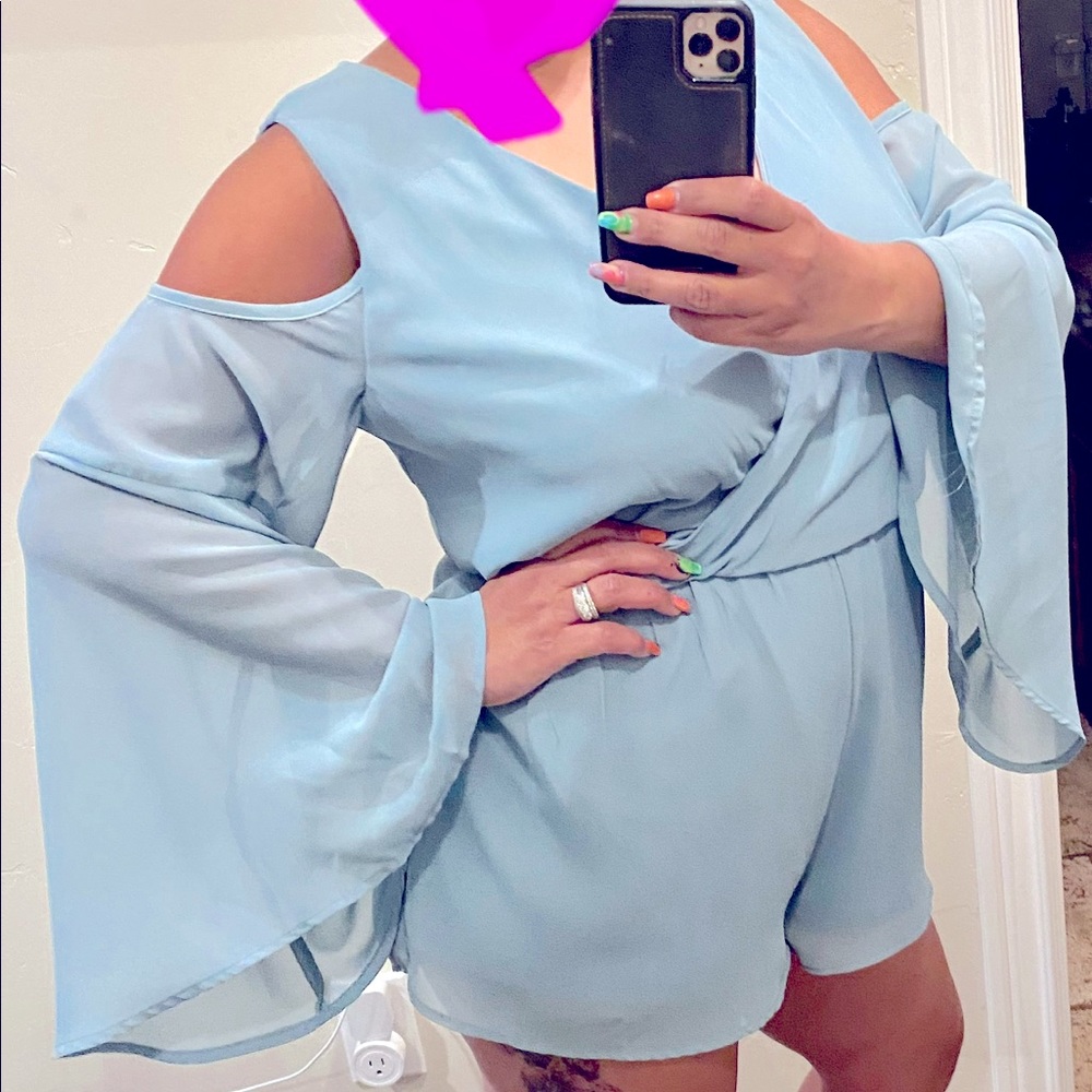 New Dusty light blue Flowery Jumper. It’s light weight comfortable & sexy